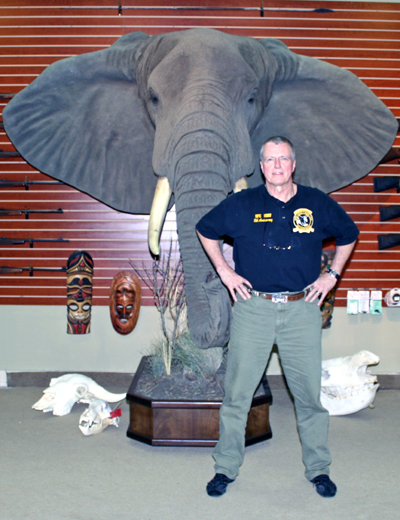 Hock Hochheims standing in front of an African Elephant